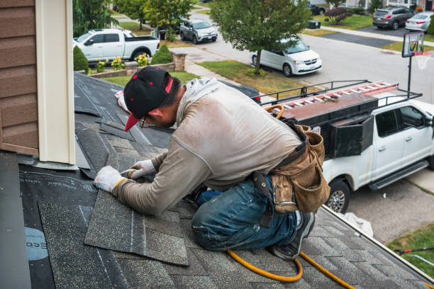 Professional Storm Damage Roof Repair technician working in Laurel Hill, VA